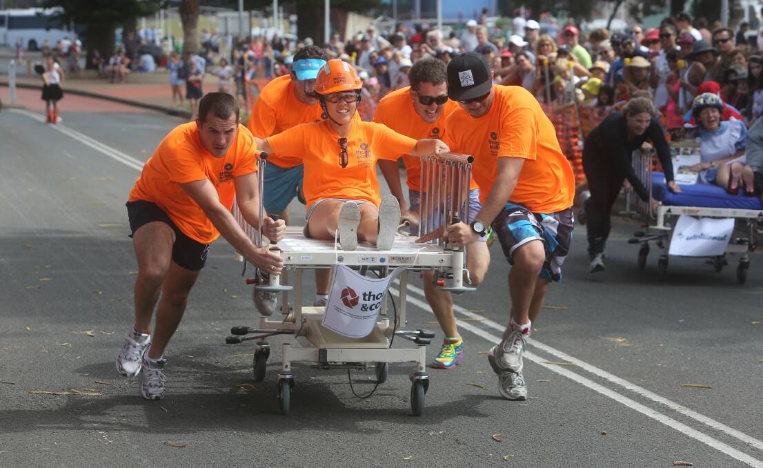 The Thomas and Coffey team in the Illawarra Rotaract Hospital Bed Run. Picture: ROBERT PEET