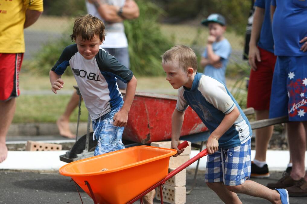 Kiama boys Ben and Jye Steel competing in the brickies race at Kiama. Pictures: Dylan Robinson