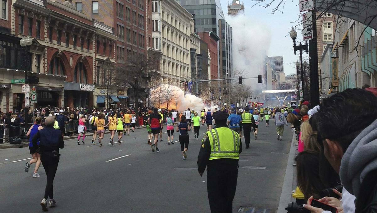 A bomb rips through the Boston Marathon. Picture: REUTERS
