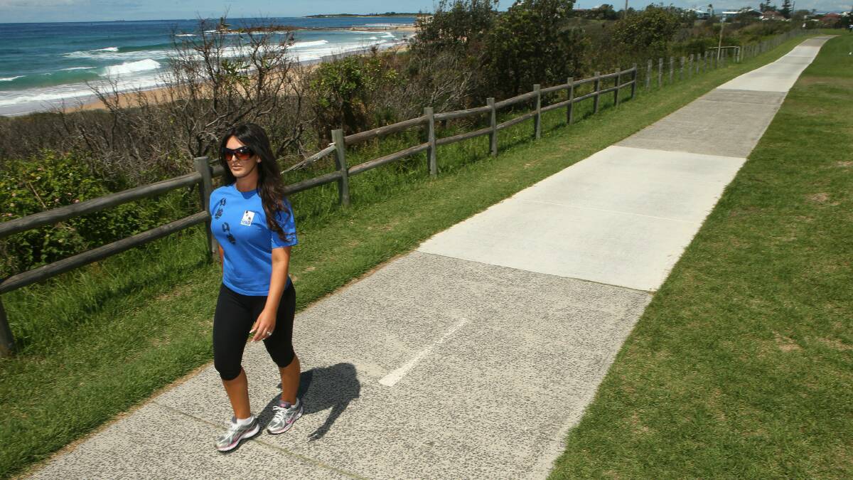 Shelly-Anne Demirov preparing for the Walk to d’Feet Motor Neurone Disease at Bulli. Her father died in 2010 after battling MND. Picture: KIRK GILMOUR