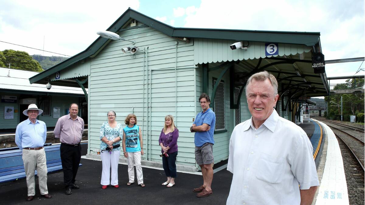Thirroul Village Committee secretary Murray Jones (front), Gary Chapman, Councillor Greg Petty, Suzette Deville, Bronwyn Hutchieson, Kerrie Christian and Steve Dillon outside the heritage-listed Thirroul station building. Picture: KIRK GILMOUR