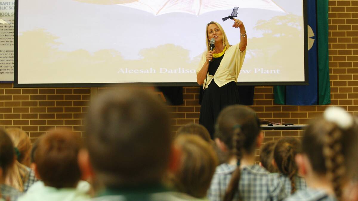 Author Aleesah Darlison reads to students at Pleasant Heights Public School. Darlison will be taking part in Kids Day Out in Thirroul on January 16. Picture: CHRISTOPHER CHAN