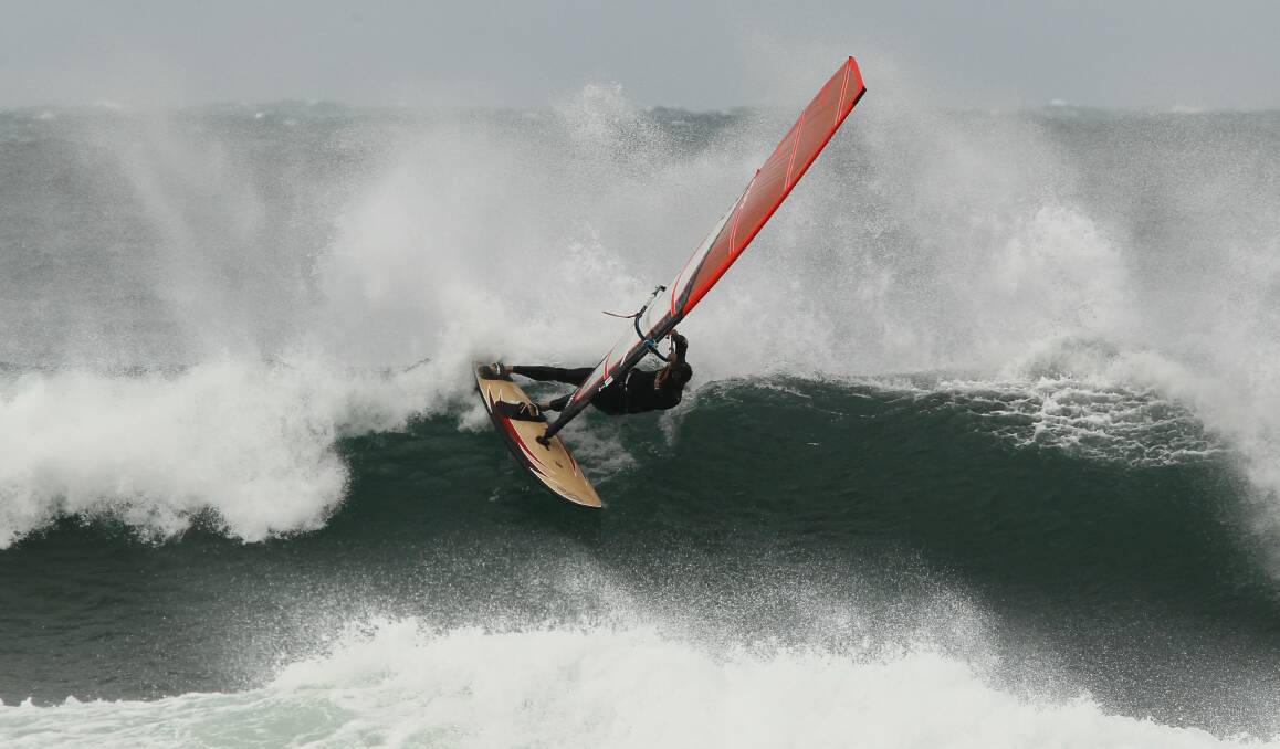 Wind surfers at Cowrie Island, Shellharbour. Picture: DAVE TEASE