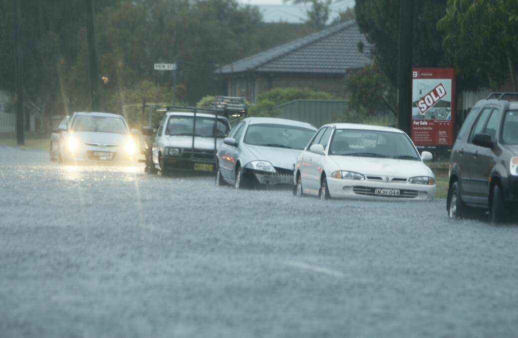 Flooding at Windang. Picture: DAVE TEASE. Click through for more photos.