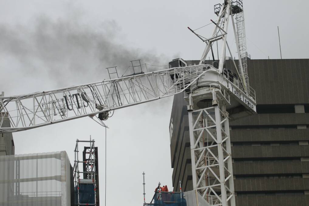 Crane collapses at UTS. Pictures: NICK MOIR