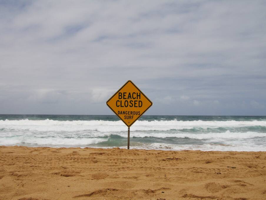 Beach closed sign.