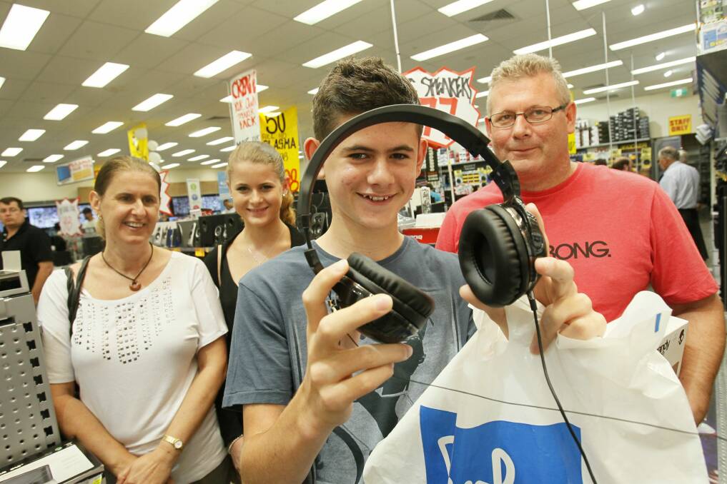 Angie, Lauren, Beau and Jim Davis, of Dapto, shopping at JB Hi-Fi. Pictures: DAVE TEASE
