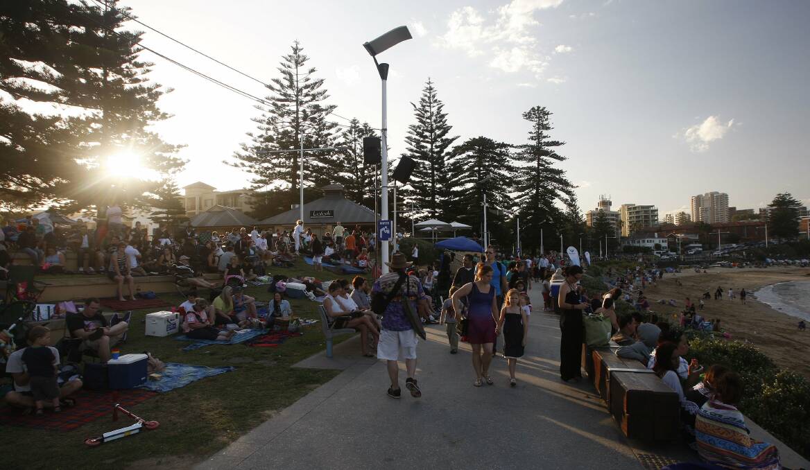 People flock to Belmore Basin ahead of the NYE fireworks.