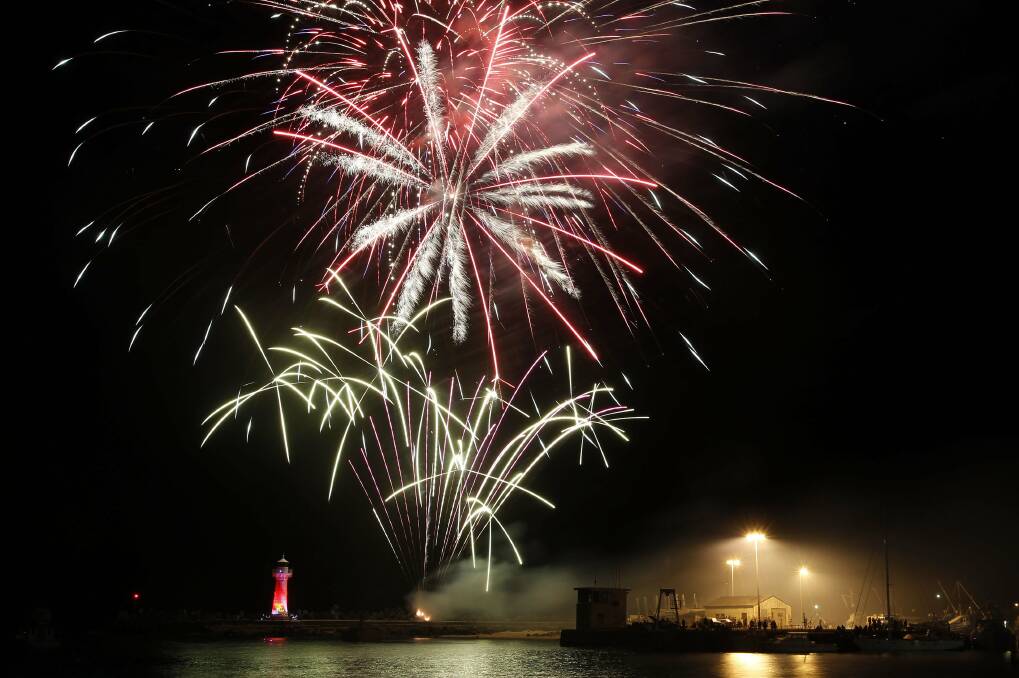 Fireworks illuminate the night sky as revellers farewell 2012 in Wollongong.