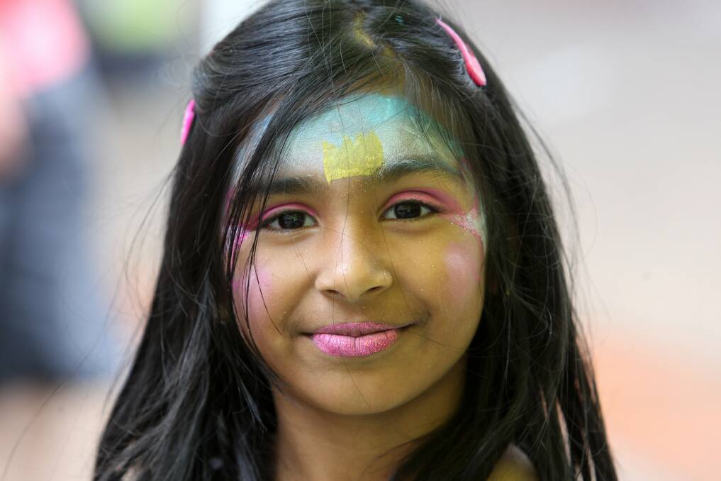 Asniya Aziz, 6, of Fairy Meadow, wore bright colours for her visit to the rink. Picture: GREG TOTMAN