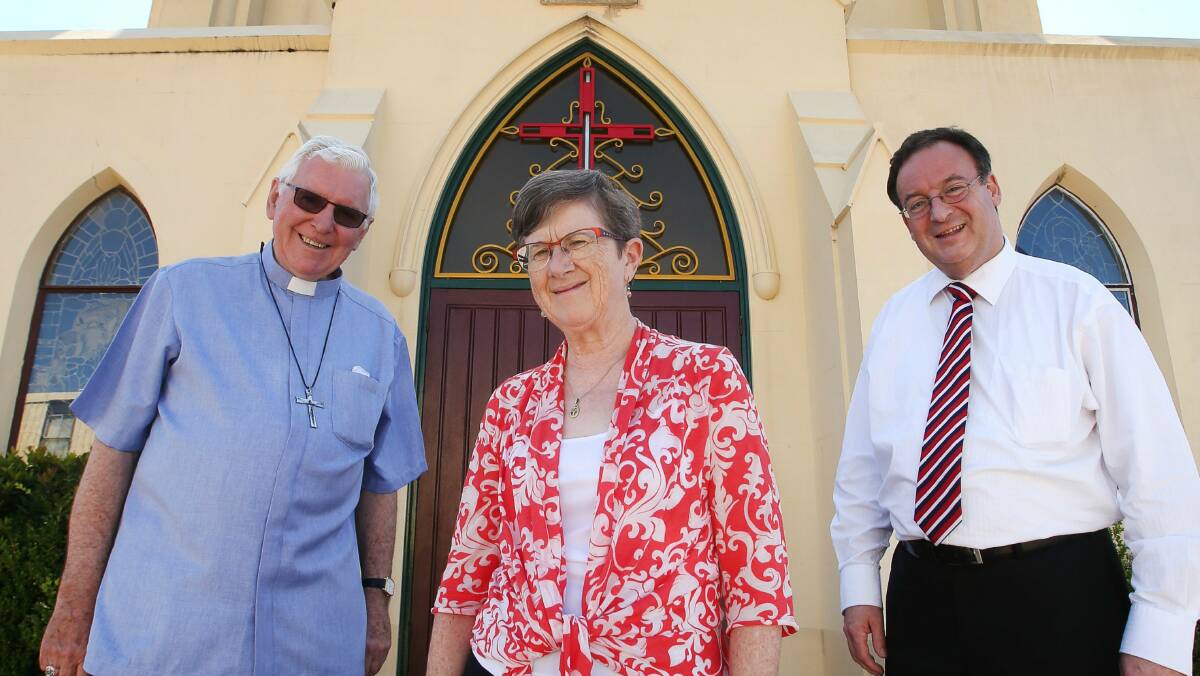  Bishop Peter Ingham, Sister Carmel and liturgy co-ordinator Paul Mason outside St Francis Xavier Cathedral in Wollongong. Picture: KIRK GILMOUR
