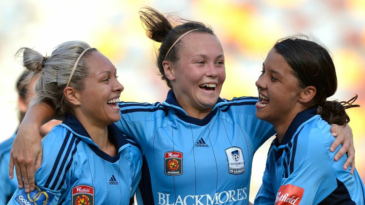 Annalie Longo, Caitlin Foord and Samantha Kerr celebrate victory after the W-League Semi Final match between the Brisbane Roar and Sydney FC  at the start of the year.