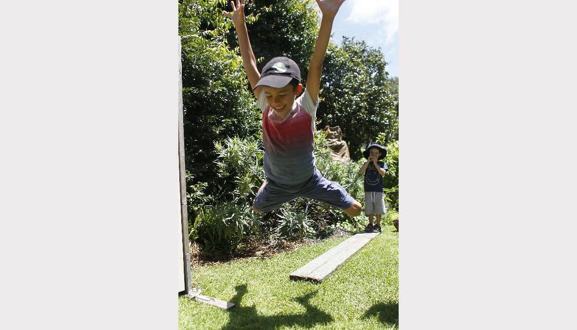 Phoenix Duncan, 7, takes a leap. Picture: CHRISTOPHER CHAN