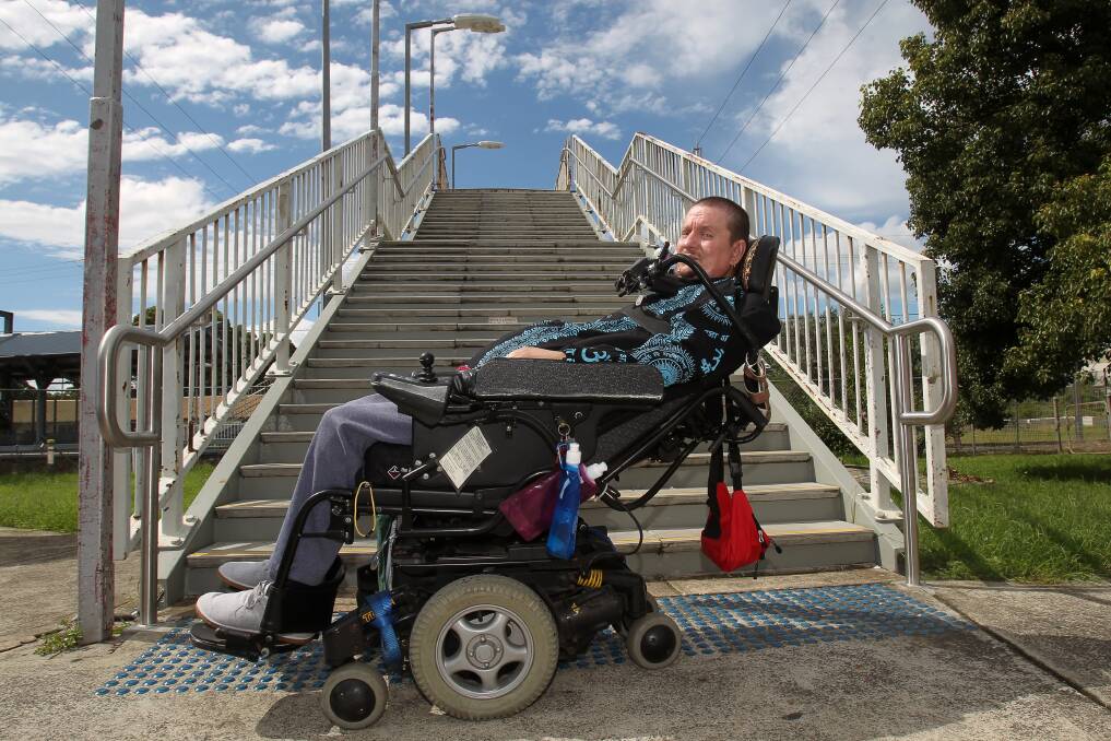 Richard Kramer at Unanderra station which has no lift access for disabled people. GREG TOTMAN