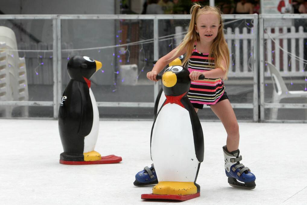 Mackenzie Doulton, 7, of Bulli, gets her balance on the rink. Picture: GREG TOTMAN