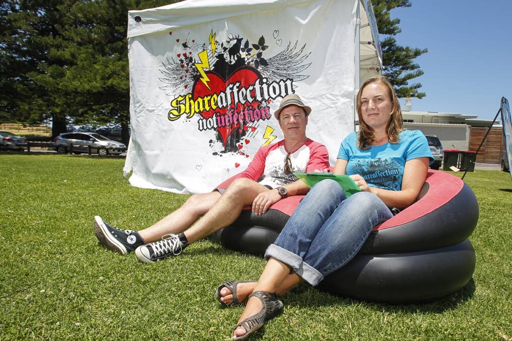 Marty Janssen and Nadia Sheyd-Miller, from Healthy Cities Illawarra, at Thirroul Beach where they set up a mobile chlamydia testing station to promote youth sexual health. Picture: CHRISTOPHER CHAN