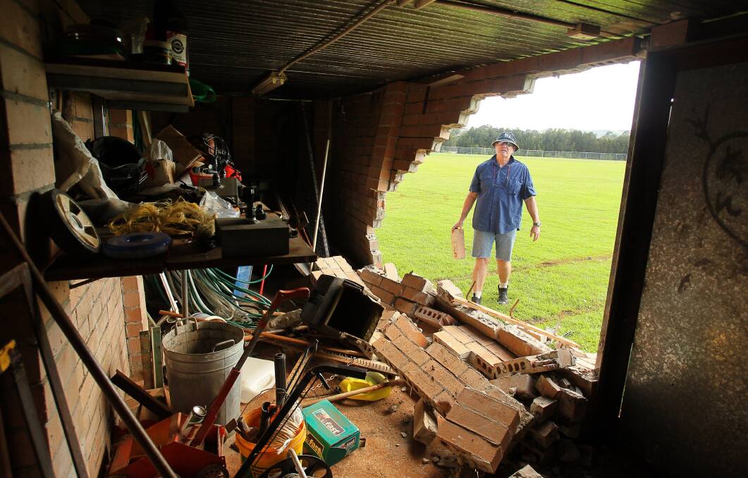 Club supporter Peter Sharp inspects the damage. Picture: KIRK GILMOUR