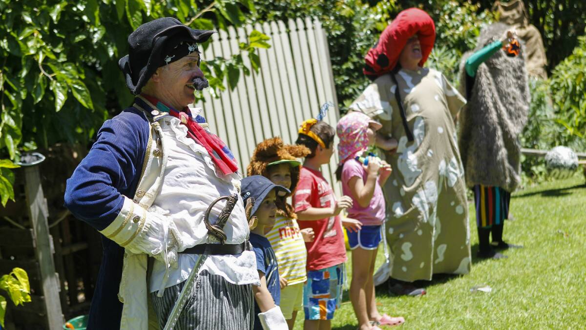 Captain Compost and the Chocolate Explorers entertain kids at Wollongong’s Botanic Garden yesterday. Picture: CHRISTOPHER CHAN