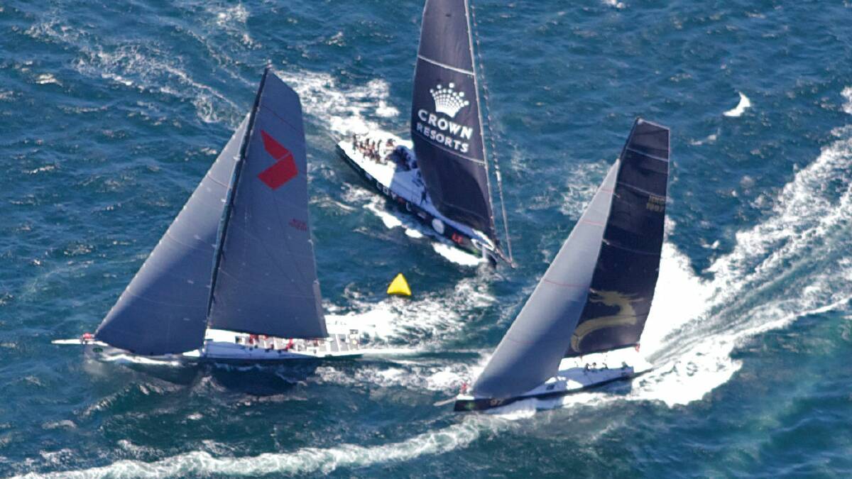 Wild Oats XI leads Beau Geste and Perpetual Loyal around the first marker.   BRENDAN ESPOSITO