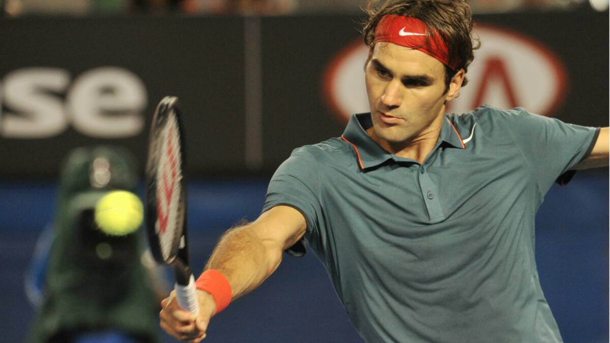 Roger Federer plays a backhand in last night's victory. Picture: JOE ARMAO