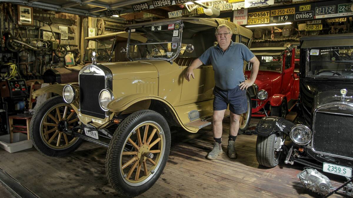 Murray Alcock in his Gerringong shed, which houses eight Model T Fords. Picture: CHRISTOPHER CHAN