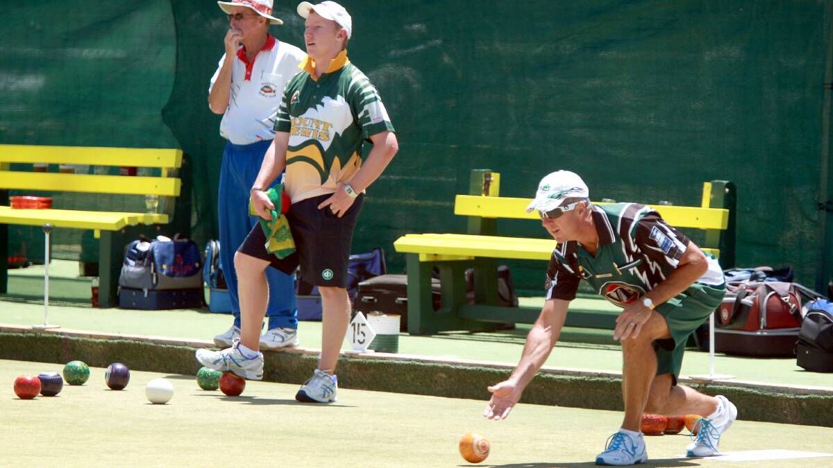 John Green (Taren Point) bowls as opponent Ben Glasson (Mt Lewis) looks on. Picture: SYLVIA LIBER