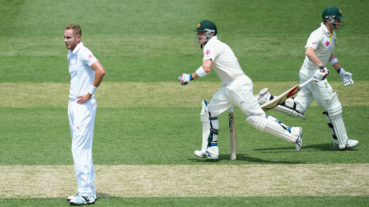 Stuart Broad watches forlornly as Brad Haddin and Steve Smith take another run. Picture: GETTY IMAGES