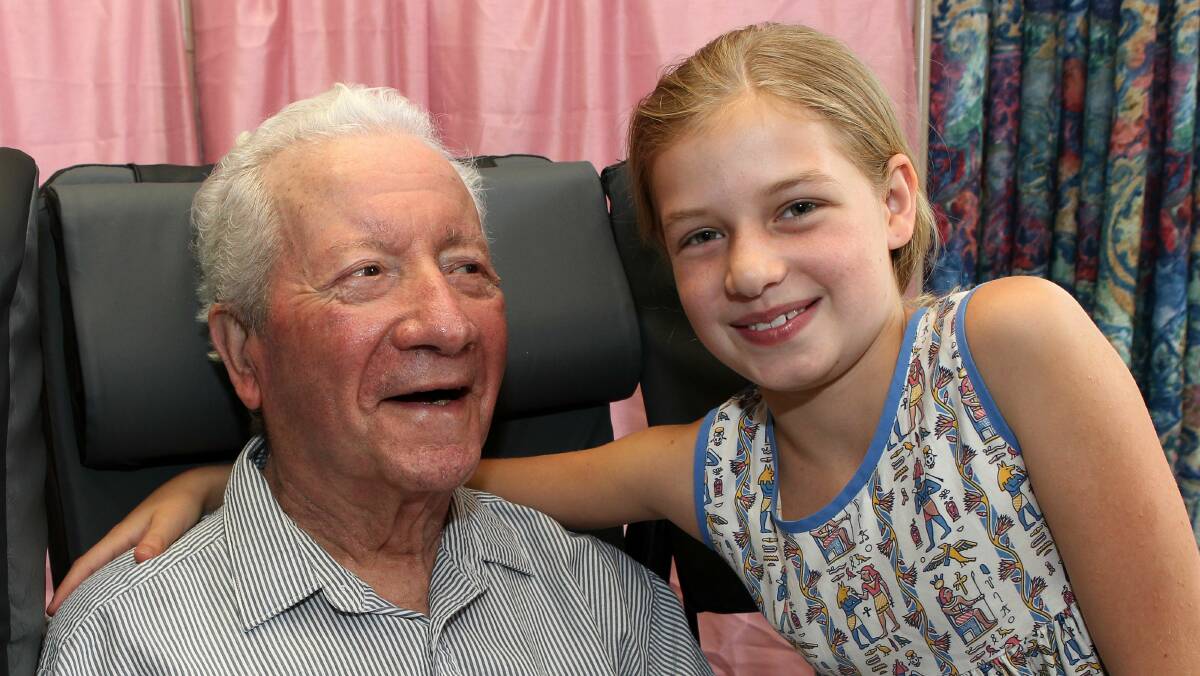 Bibi Ioannou-Marsh enjoys precious time with her beloved Papu, Solon Ioannou at Chesalon nursing home, Woonona. Picture: GREG TOTMAN