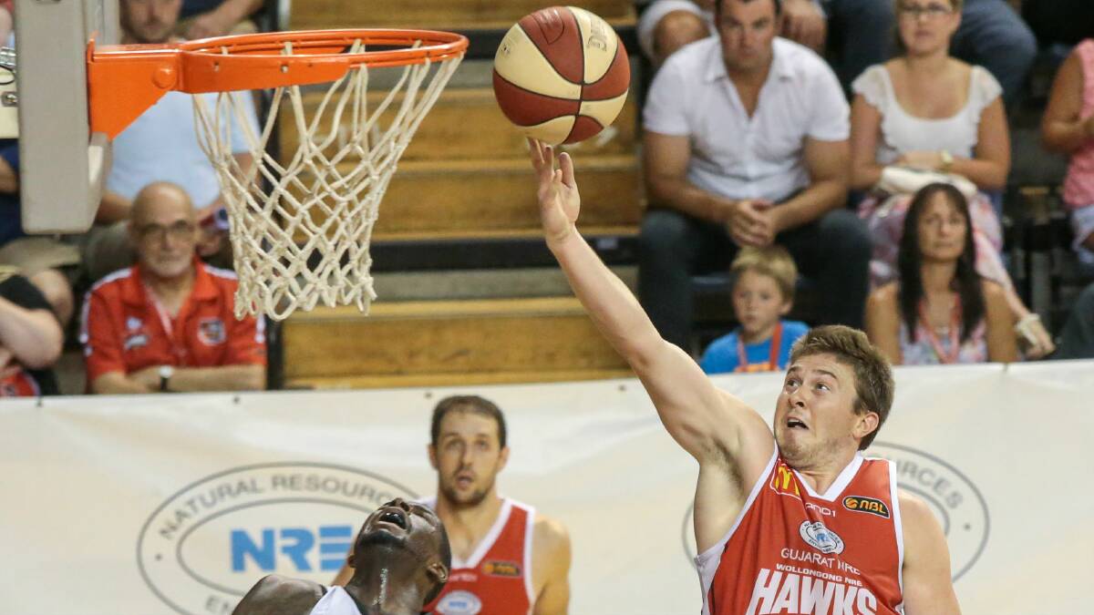 Rotnei Clarke attacks the basket en route to 28 points against Perth. Picture: ADAM McLEAN