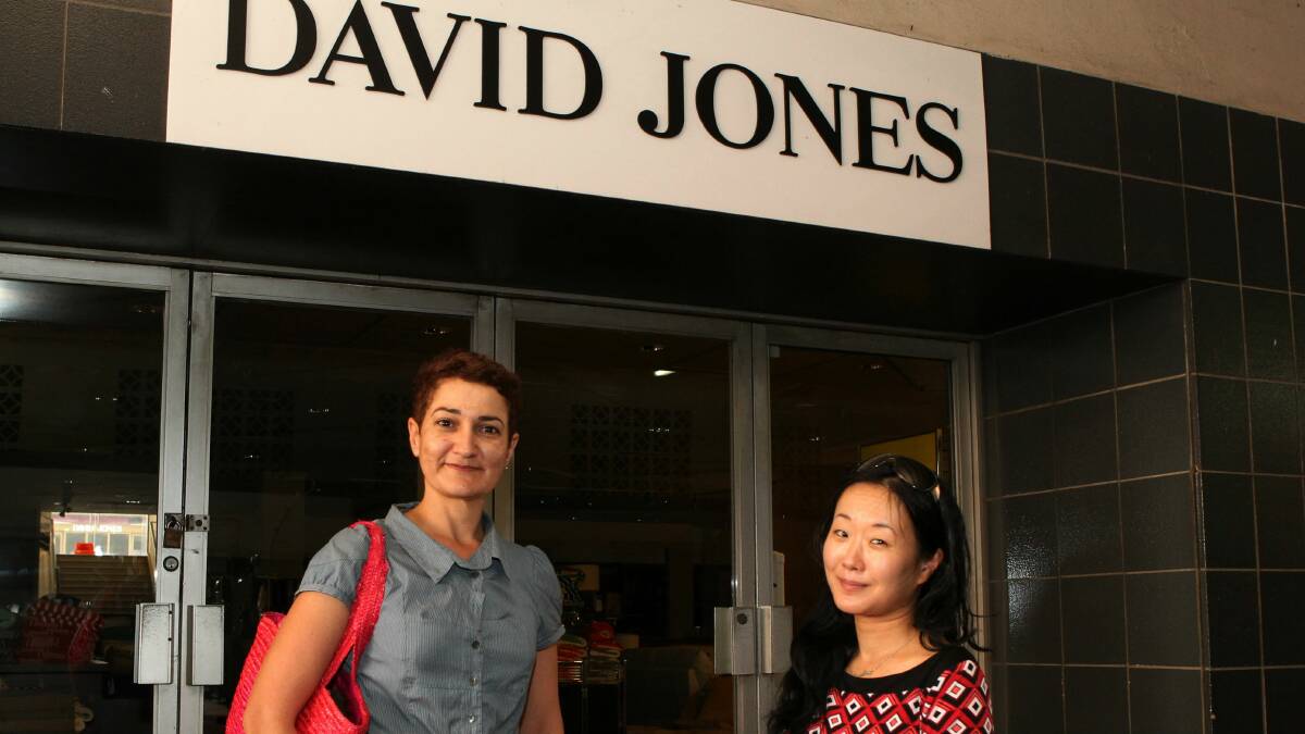 Didi Kello and Tomoko Hasebe at Crown Street Mall yesterday. Picture: GREG TOTMAN
