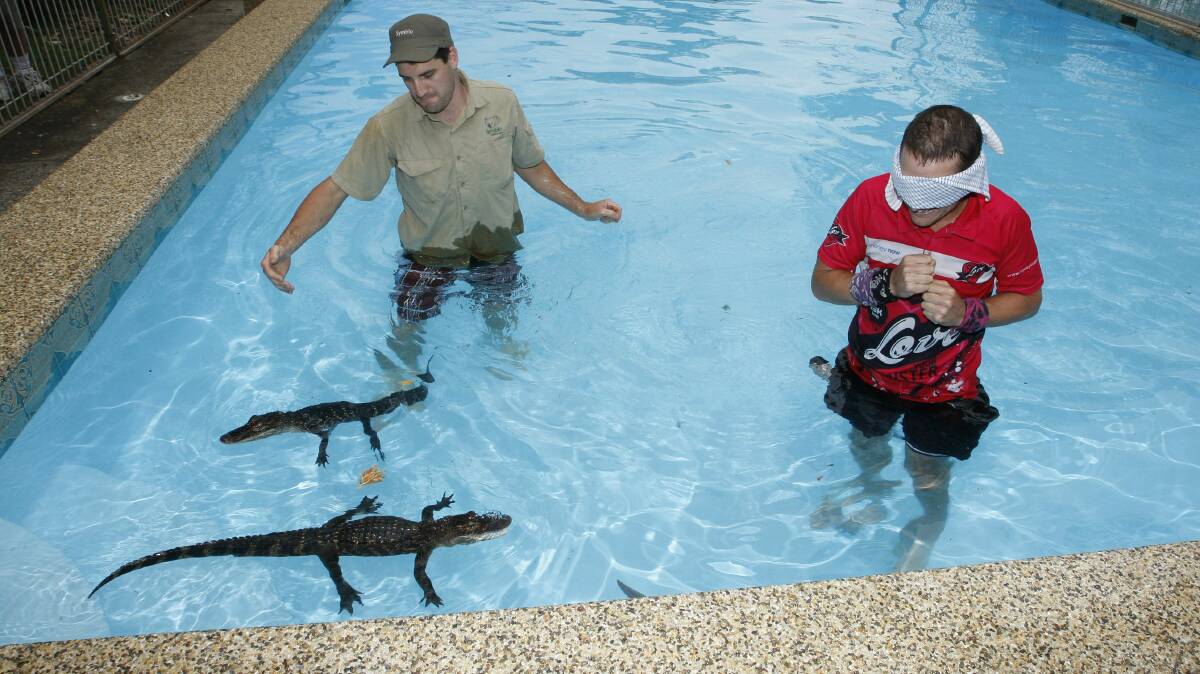 GALLERY: Baby alligators give actor anxious moment in pool