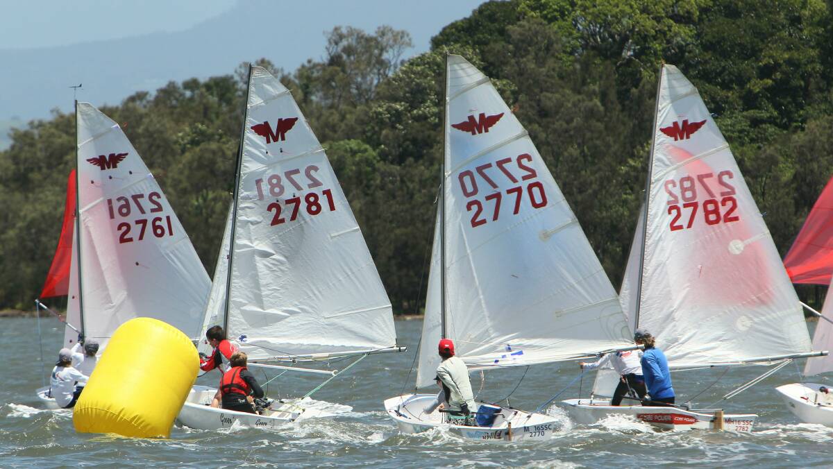 Racing was fierce during the final day of the Manly Junior national sailing championships on Lake Illawarra on Monday. Pictures: KIRK GILMOUR