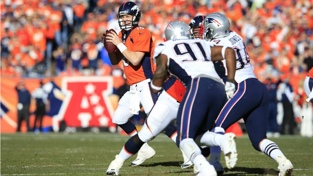Denver Broncos quarterback Peyton Manning in action against New England. Picture: GETTY IMAGES