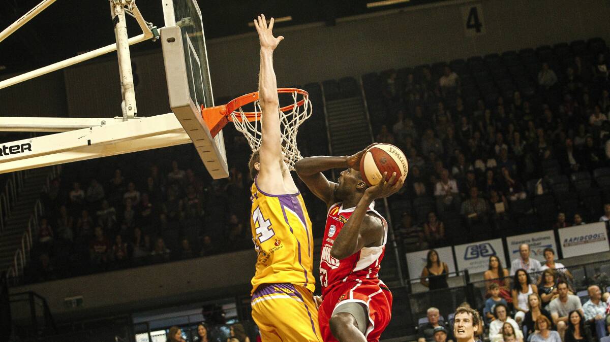 Kevin Tiggs of the Hawks goes to the basket against the Sydney Kings on Saturday. Picture: CHRISTOPHER CHAN