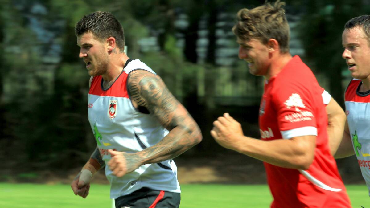 Josh Dugan (left) trains with the Dragons at UOW yesterday. Picture: ORLANDO CHIODO
