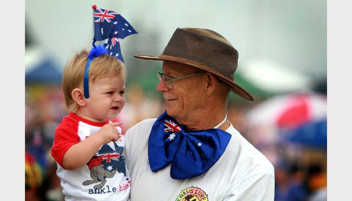 Tony Purdon with his grandson Archie Hobden, 1, of Mt Warrigal celebrate at Reddall Reserve. Pictures: SYLVIA LIBER