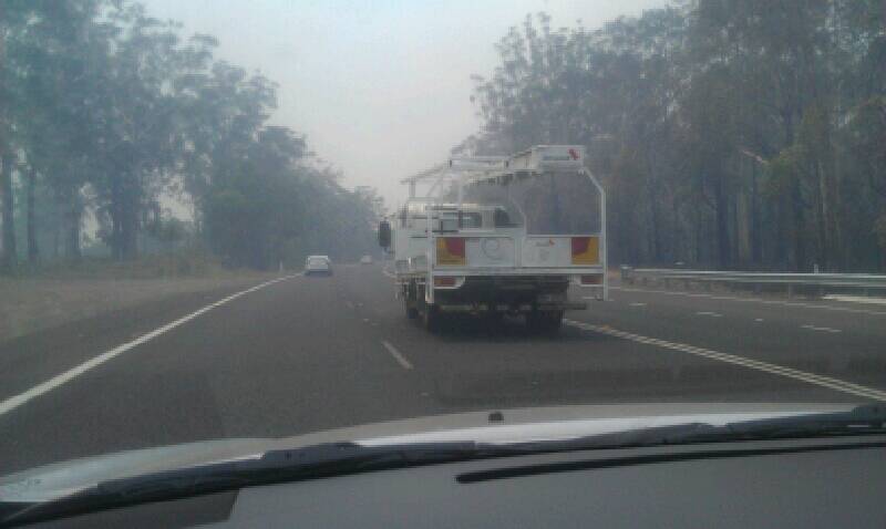 Driving through the smoke at Wandandian.