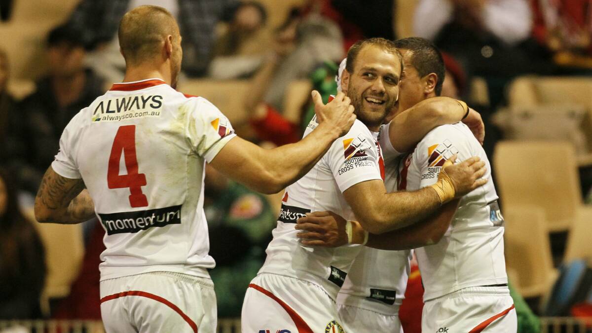 The Dragons celebrate a try at WIN Stadium last year. 