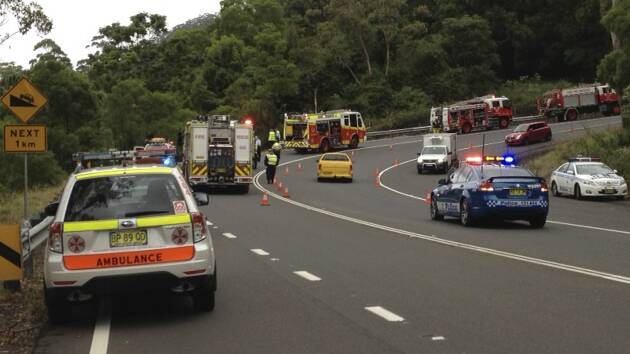 Emergency services at the scene of the crash. Pictures: KIRK GILMOUR