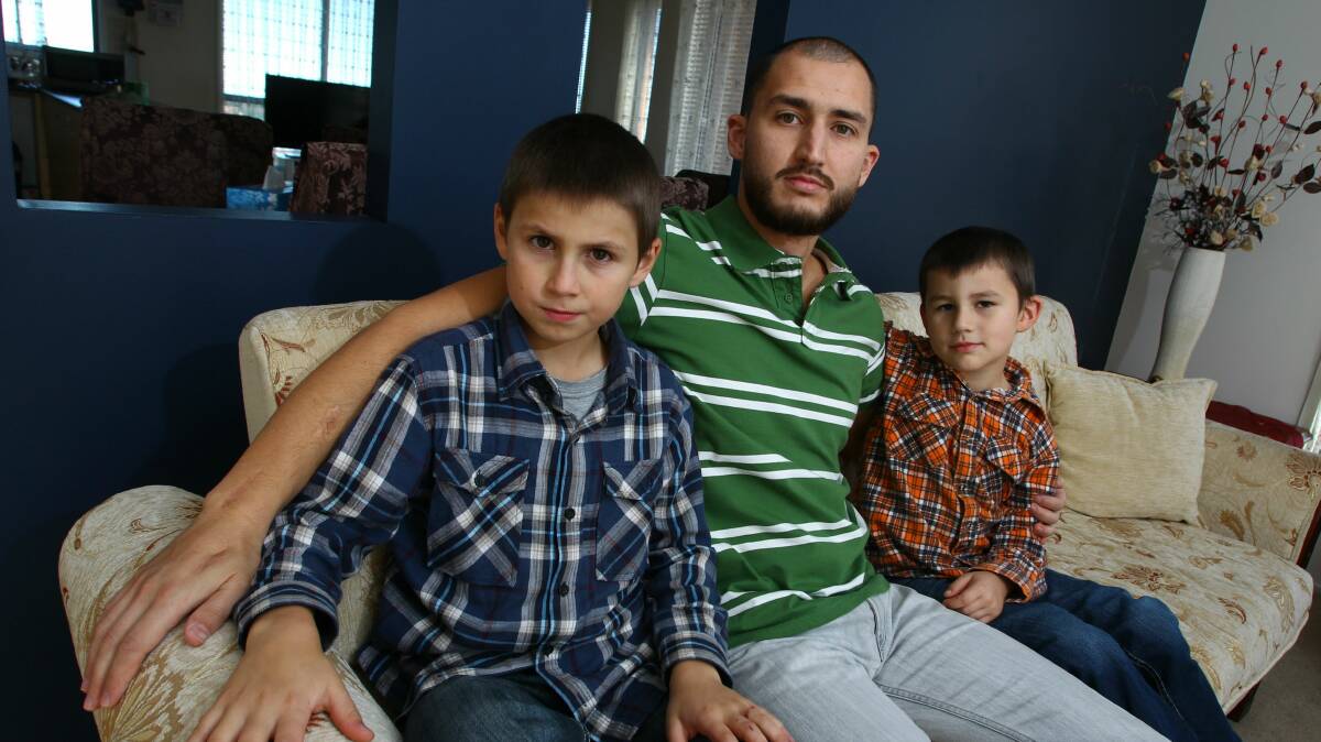 Abdurrahman Ceylan and his sons Samil, 9, and Zahid, 6, are part of the Illawarra's growing Islamic population. Picture: KEN ROBERTSON
