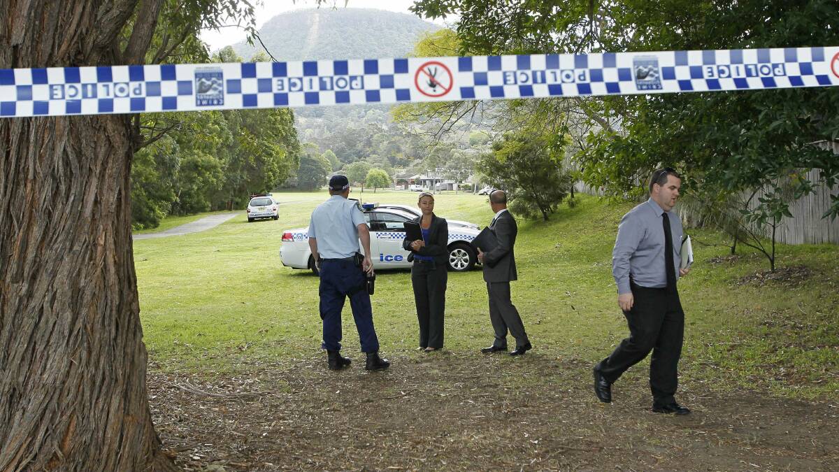 Police attend the scene at Figtree. 