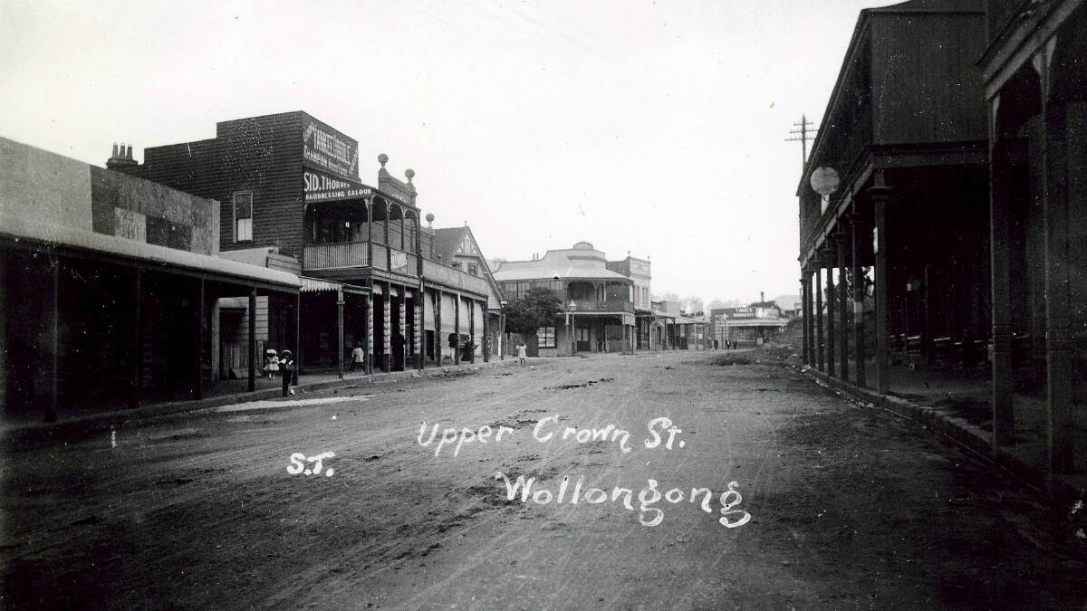 Upper Crown Street, Wollongong, with a hairdressing salon on the left in 1900. Picture: From the collections of the Wollongong City Library and the Illawarra Historical Society.