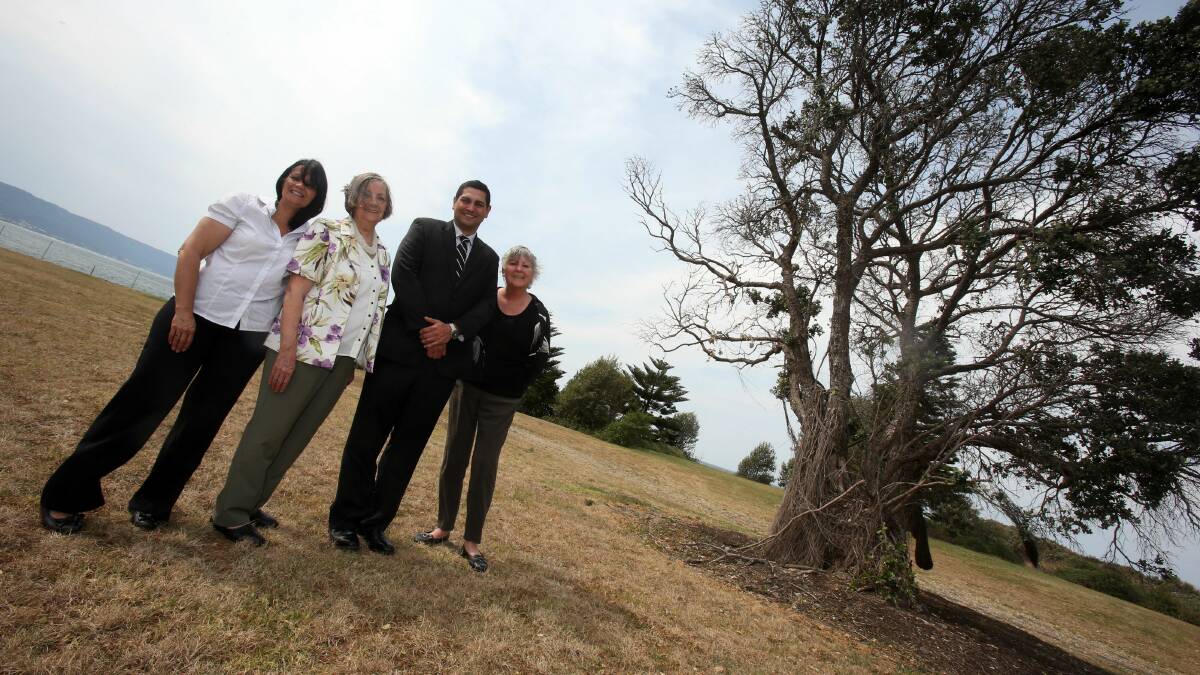  Illawarra Local Aboriginal Land Council CEO Sharralyn Robinson, Aboriginal elder Aunty Barbara Nicholson, Country, Culture and Heritage Division executive director Norman Laing, and Office of Environment and Heritage central region manager Kathleen Schilling at Bellambi Point. Picture: ROBERT PEET