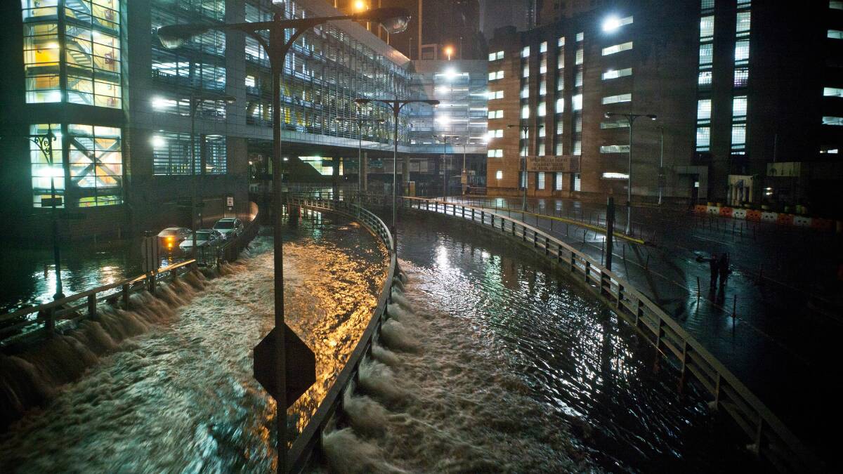 Water rushes into the Battery Tunnel in New York City. Picture: GETTY IMAGES