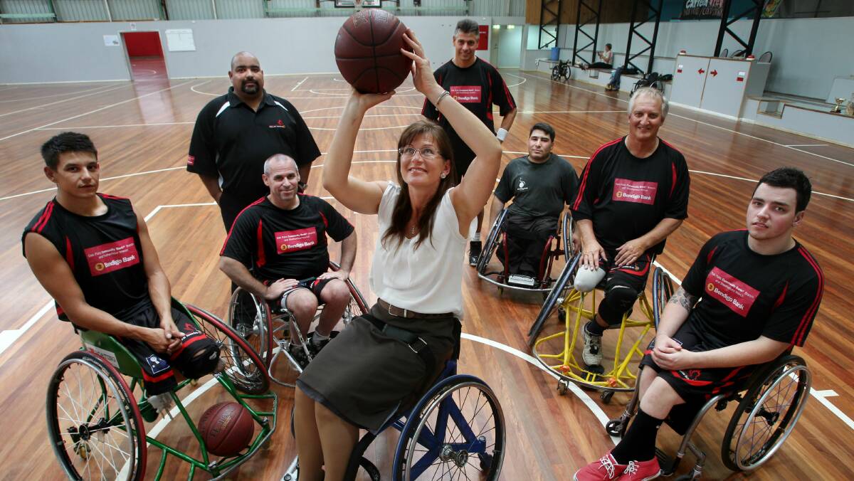 Senator Kate Lundy with the Roller Hawks at the Snakepit. Pictures: KEN ROBERTSON