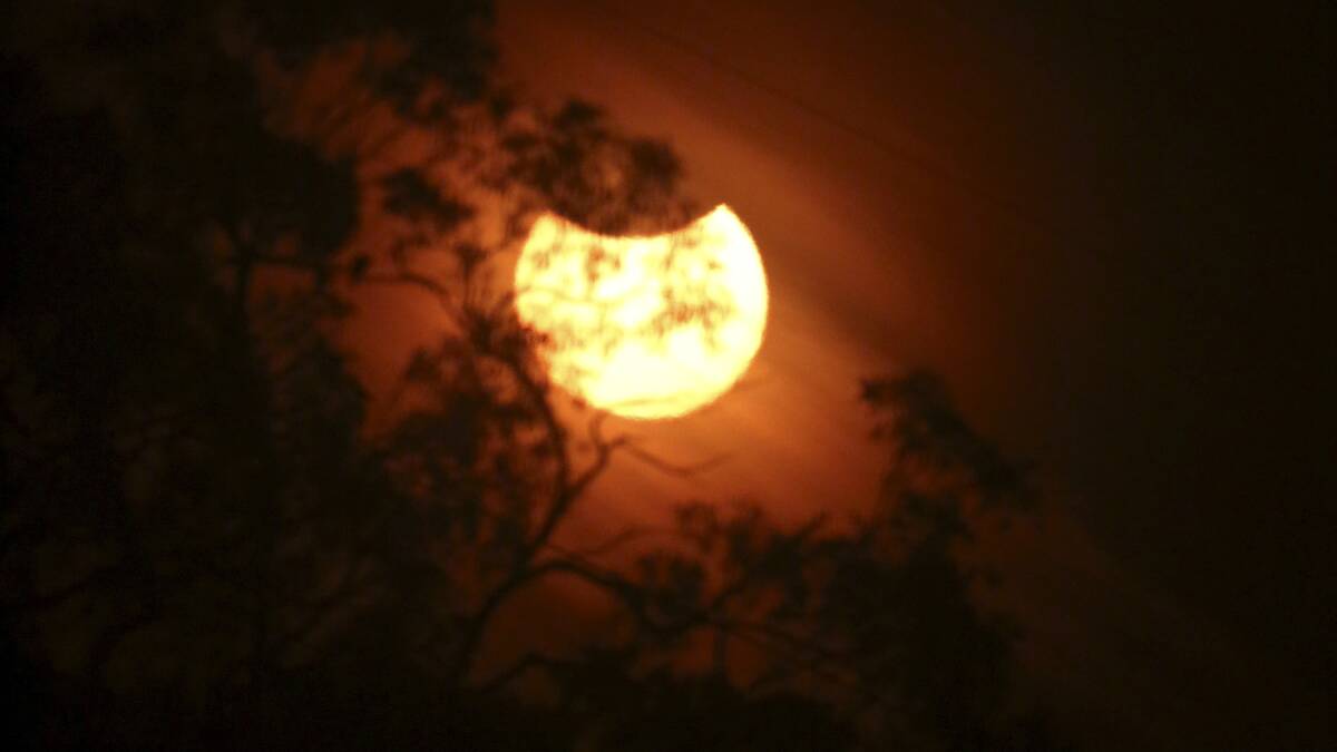 The solar eclipse, as seen from near Port Douglas. Pictures: DAVID FINLAY