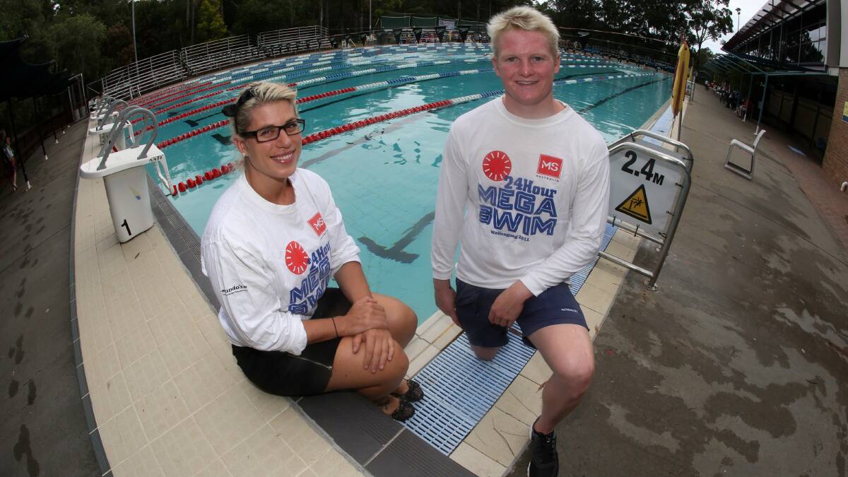  Mega Swim organiser Anita Graham and Jarrod Poort at the UOW's pool. Picture: ROBERT PEET