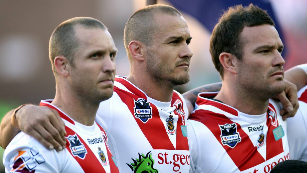 Matt Cooper (centre) lines up with teammates Ben Hornby and Dean Young in 2012. Picture: Chris Lane