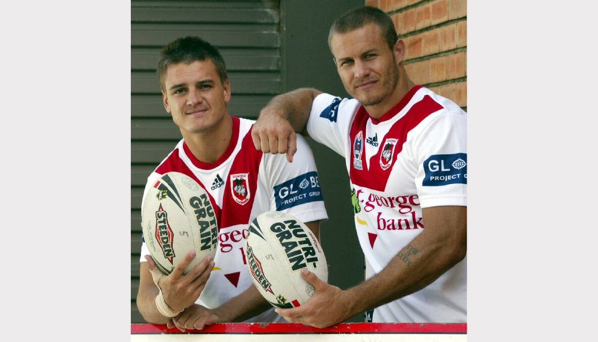 Matt Copper, notching up his 100th game for the Dragons, with teammate Andrew Price, who was the club's 100th player, in 2006. Picture: Wayne Venables