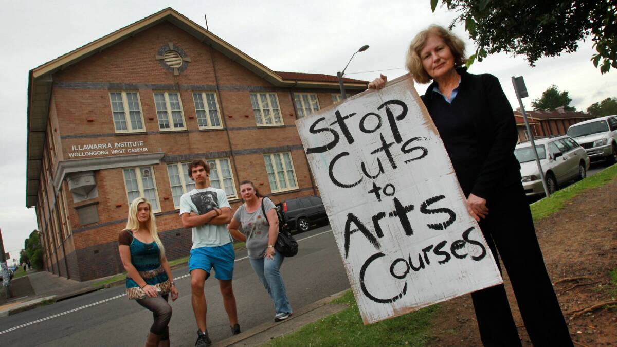 Save TAFE Illawarra chairwoman Ann Clark, with TAFE West Wollongong students, who is protesting against cuts to creative arts courses. 